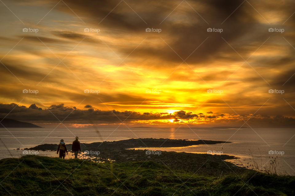 Walking into sunset