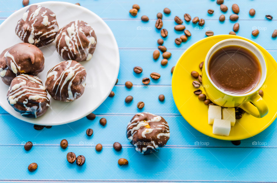 Chocolate balls and coffee cup