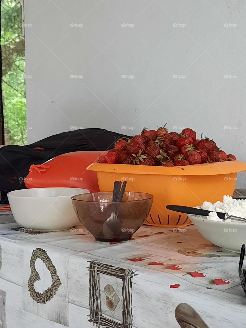 ready to eat countryside strawberries on table on the porch