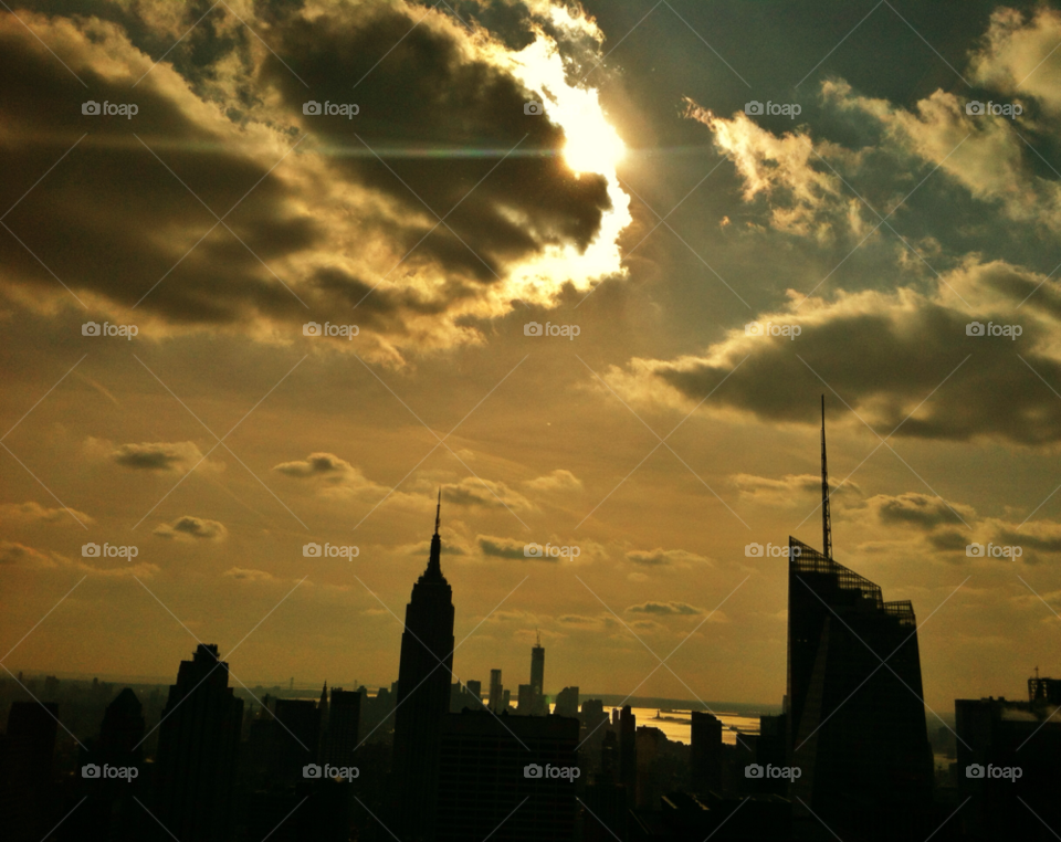 nyc sun building cloudy by delvec