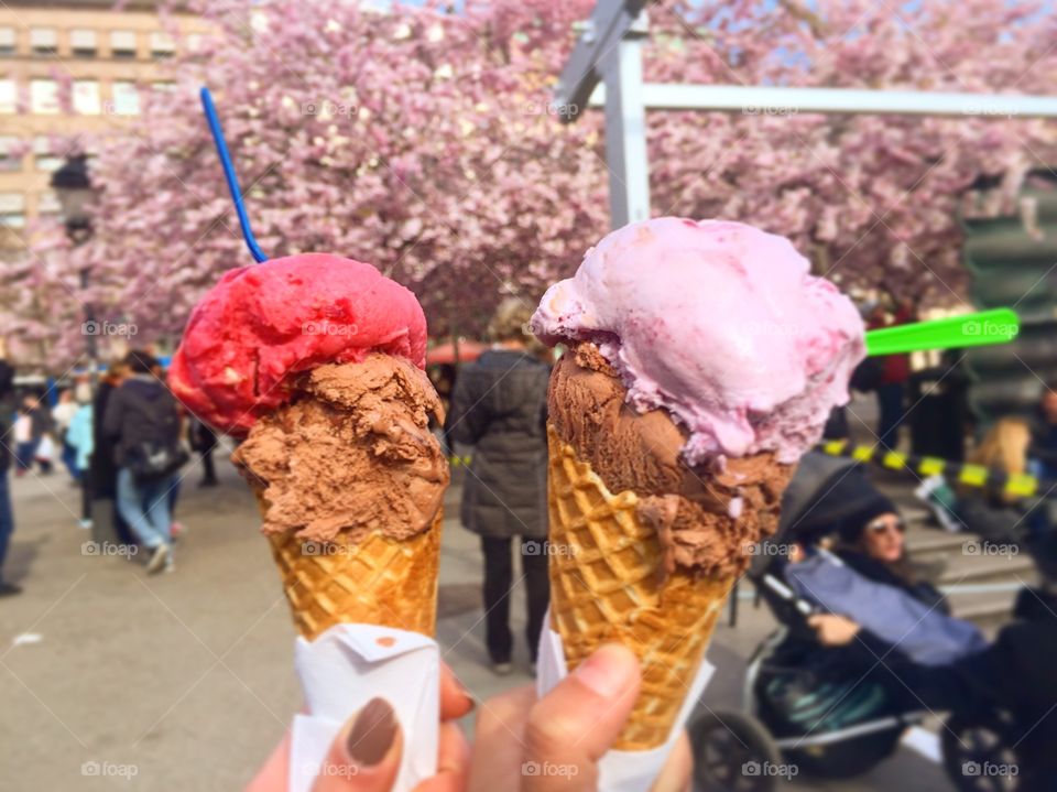 Hands holding ice cream