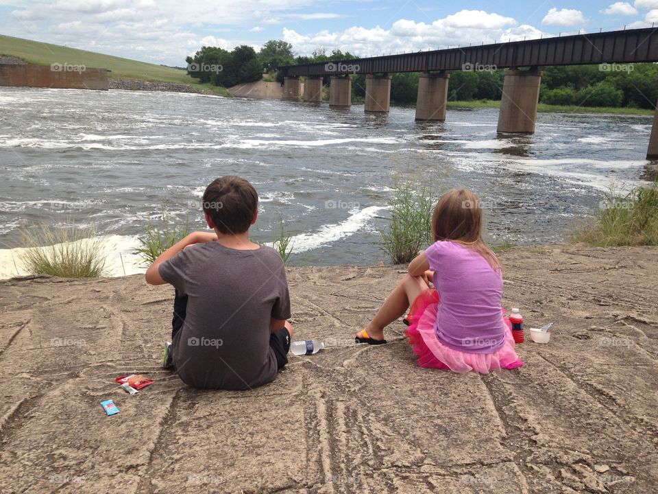 On an adventure. Kids picnicking at Lavon dam