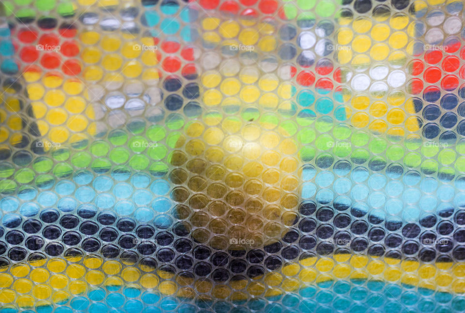 Abstract colorful background with an apple and plastic bubbles