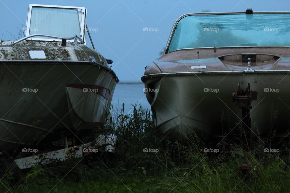 A couple of abandoned boats captured near the lake on a photography journey recently 