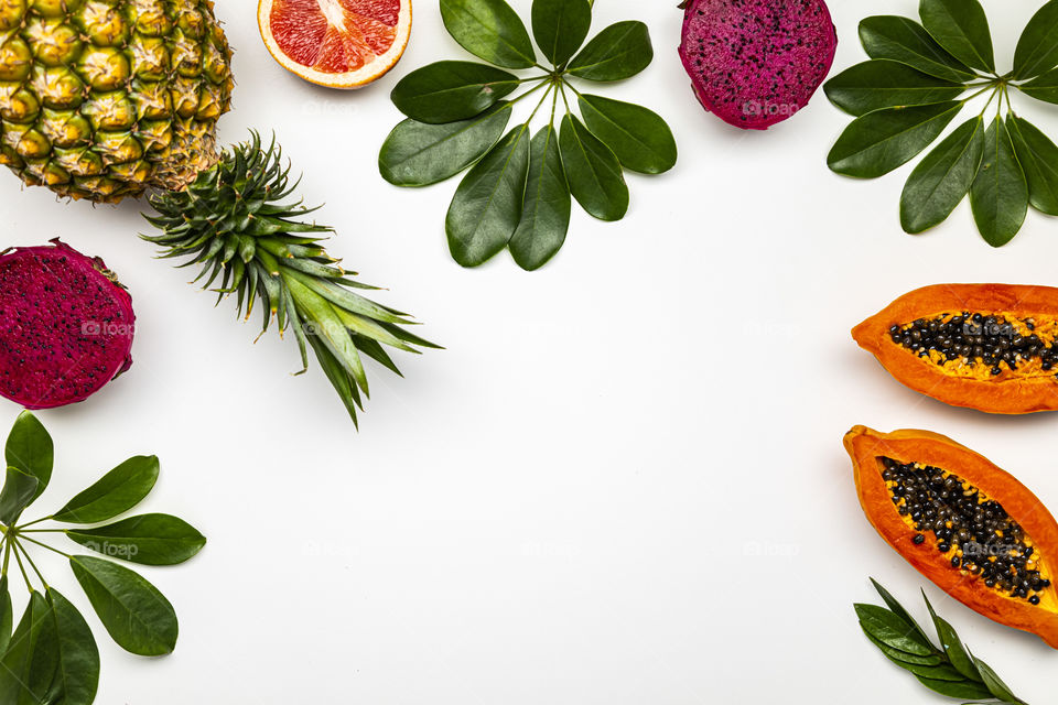 Exotic fruits. Colored background.