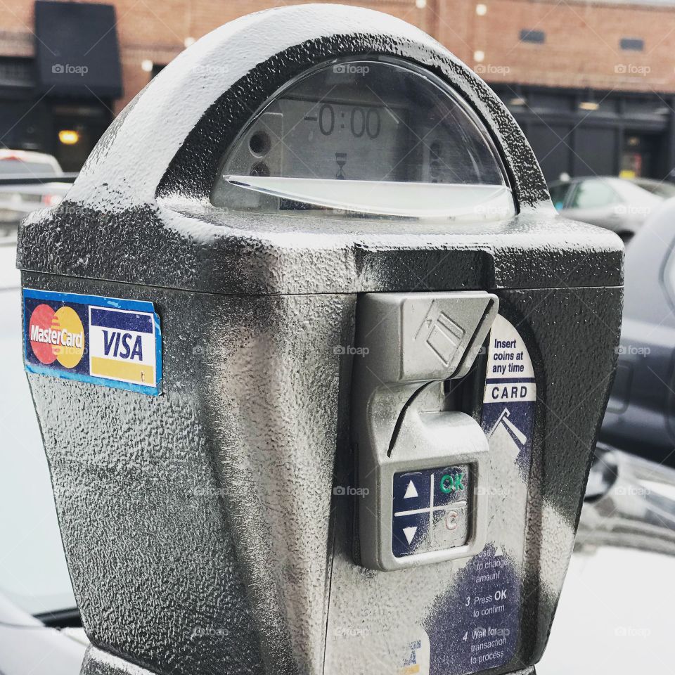 Parking meter: from coins to credit cards. 