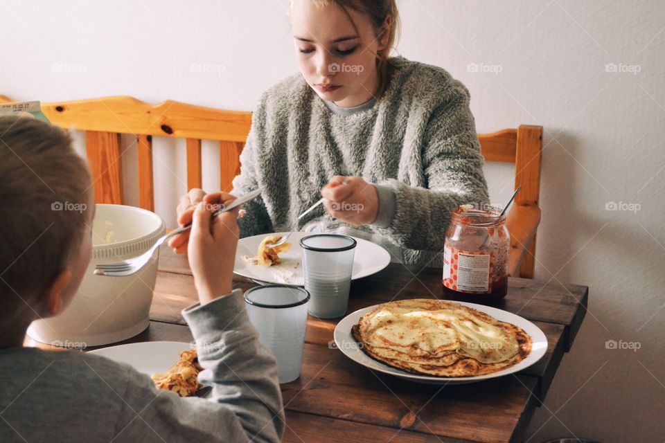 Eating pancakes