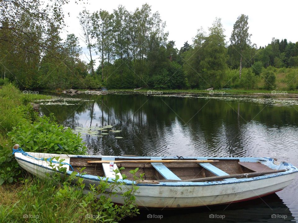 summertime, skiff in a lake