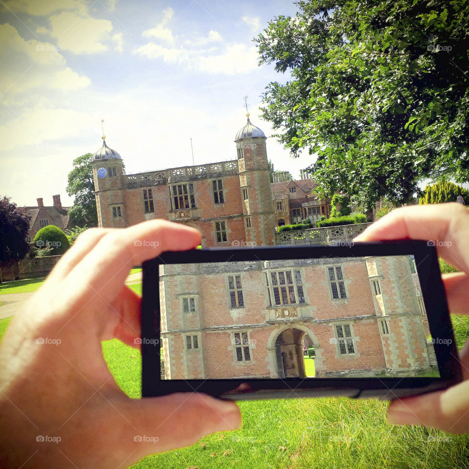 Phone. Camera phone Tourist taking a picture with a smartphone cell phone mobile phone camera 