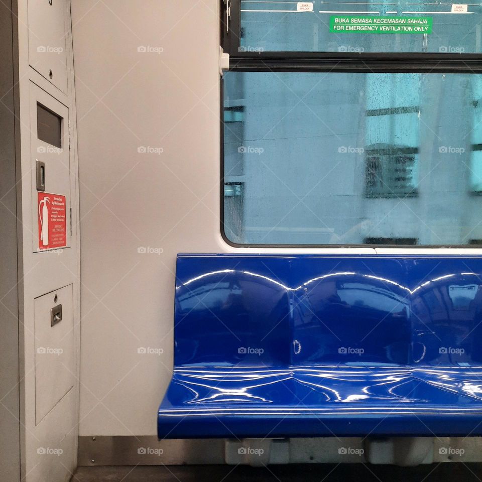 empty train seats raining