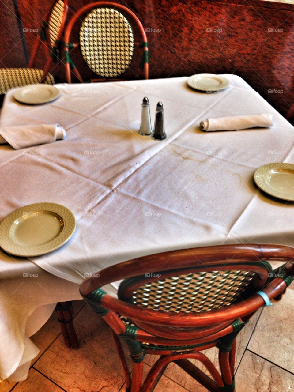 Table for four. A table set for four at a restaurant 