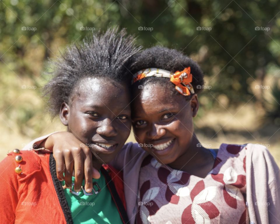 Friends returning from church in Zambia