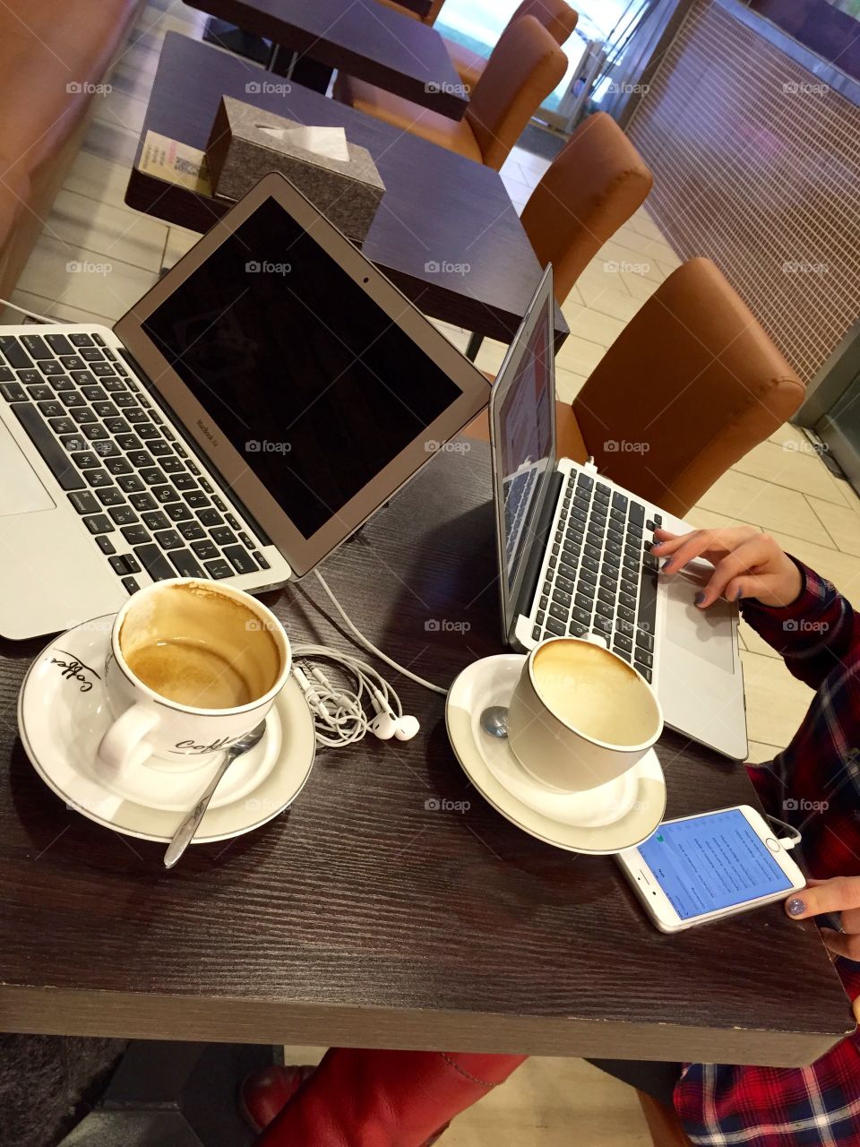 Working together over coffee in a coffeeshop
