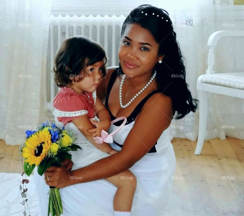 Bride with her little daughter