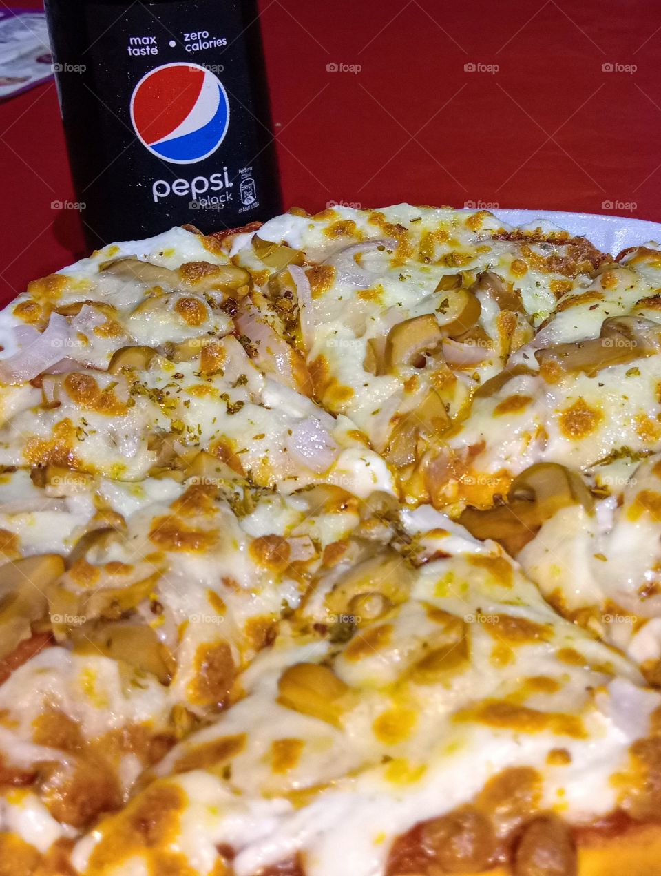 Pizza with pepsi