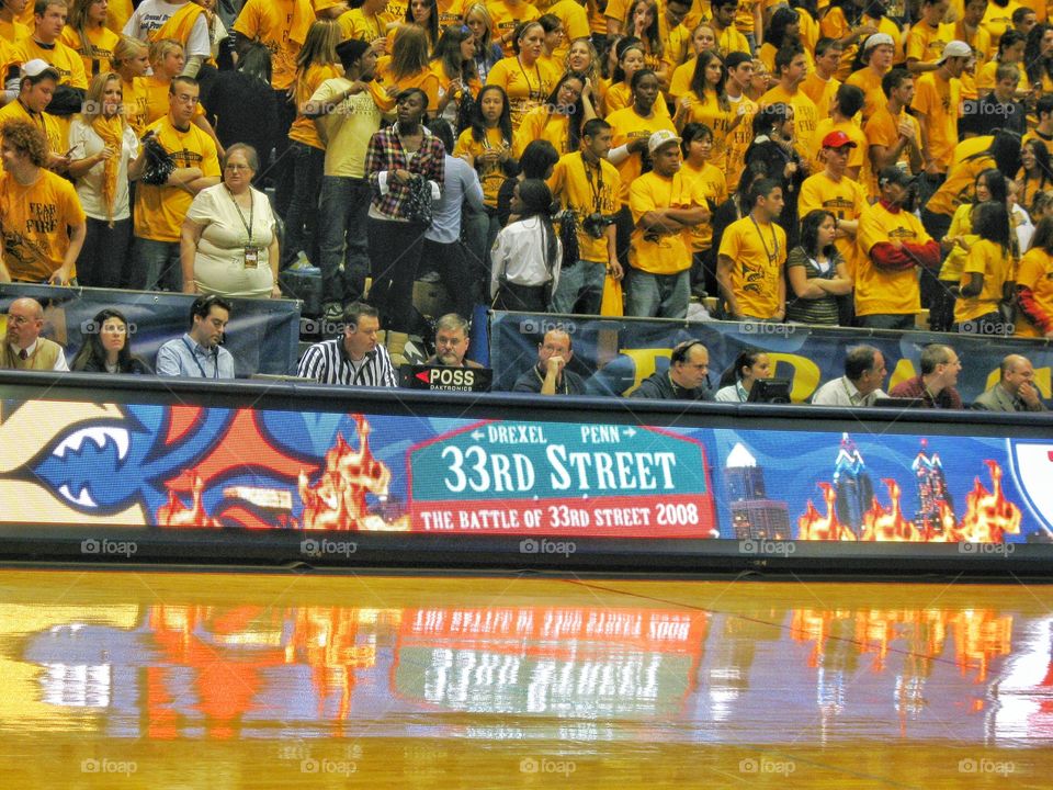 Drexel vs Upenn basketball game. Drexel supporters are shown.