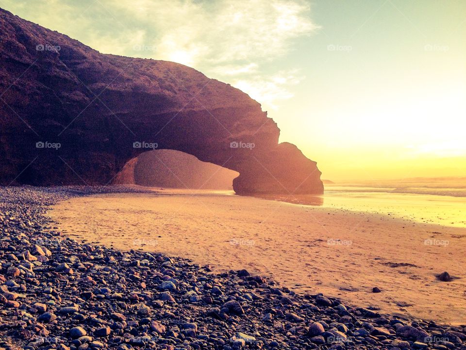 Sunset on Legzira in Morocco