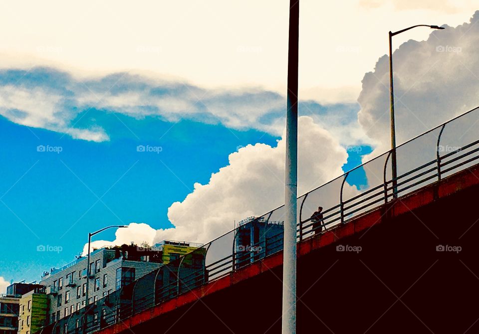 Cloudy skies over Long Island City, Queens, New York near Borden Avenue and the Pulaski Bridge photographed in 2019. Hypnotic Productions