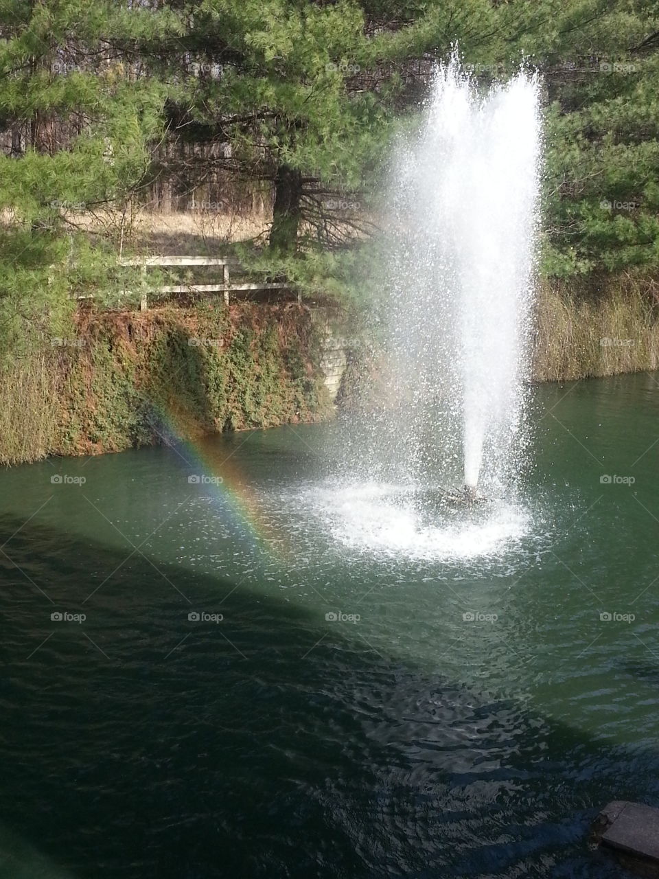 waterfall with a rainbow. waterfalls with a rainbow