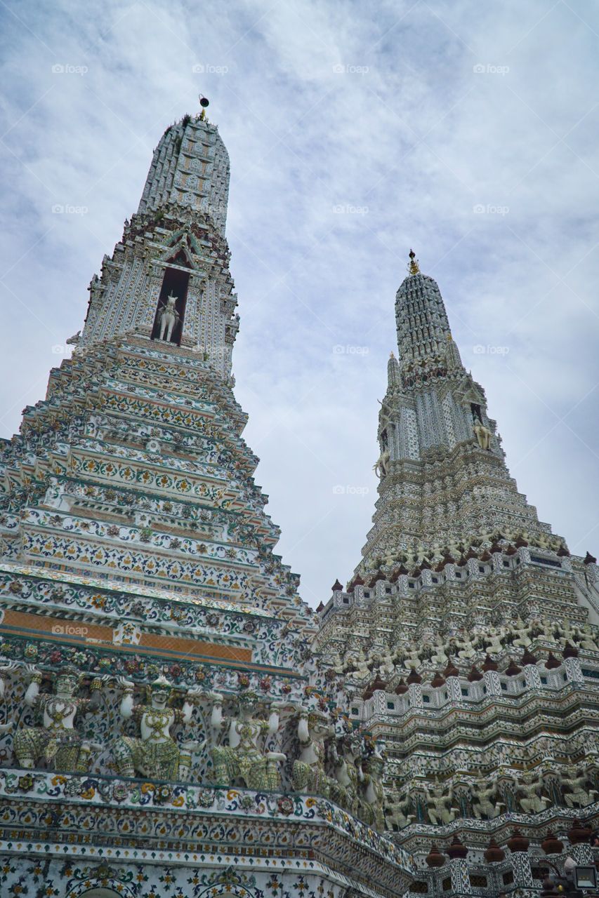 twin tower of wat arun templenin bangkok thailand