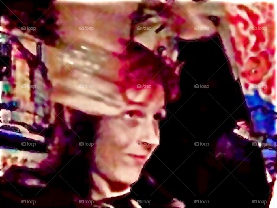 This is a capture in mid motion while making dance moves with an assembly of gold bangles. The overall vibe that is created here reminds of a Buddhist temple. Each photograph in a panel received a different color treatment. 2009. Hypnotic Productions