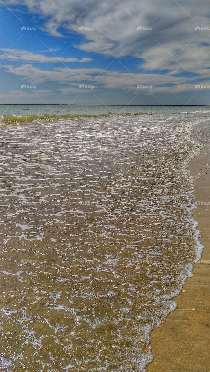 In the beach watching the waves