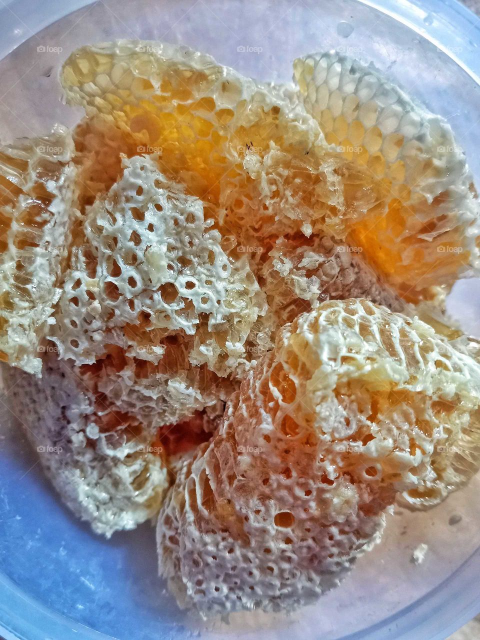 pure honey collected by bees, organic, healthy nutrition, bees collect nectar and convert complex sugar into simple sugar like glucose, fructose.