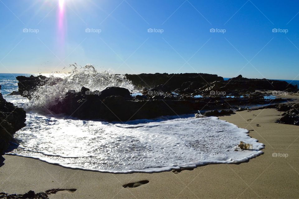 Morning Beach Stroll. A walk along the beach as the waves crash all around is always a perfect way to start the day.