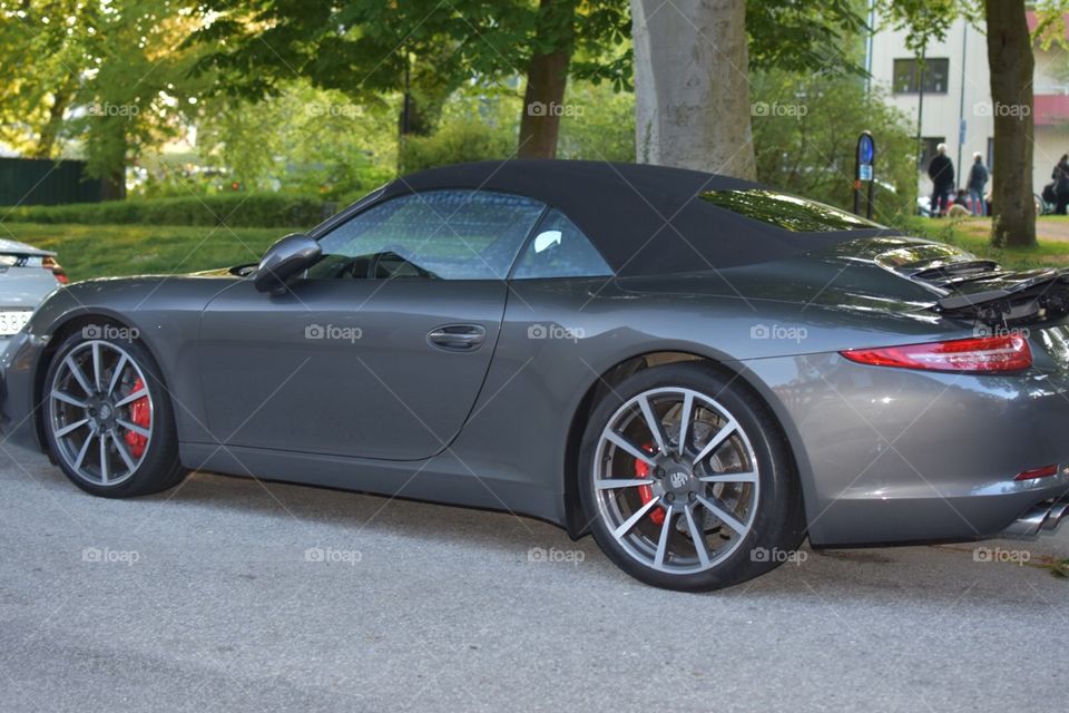 Veteran car cruising in town. 