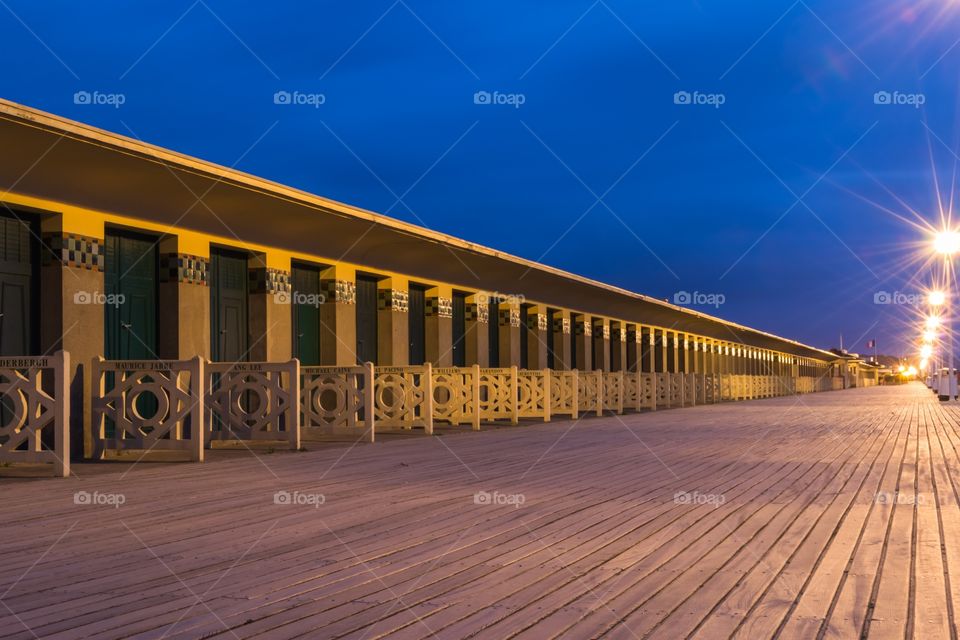 The Deauville boards at night