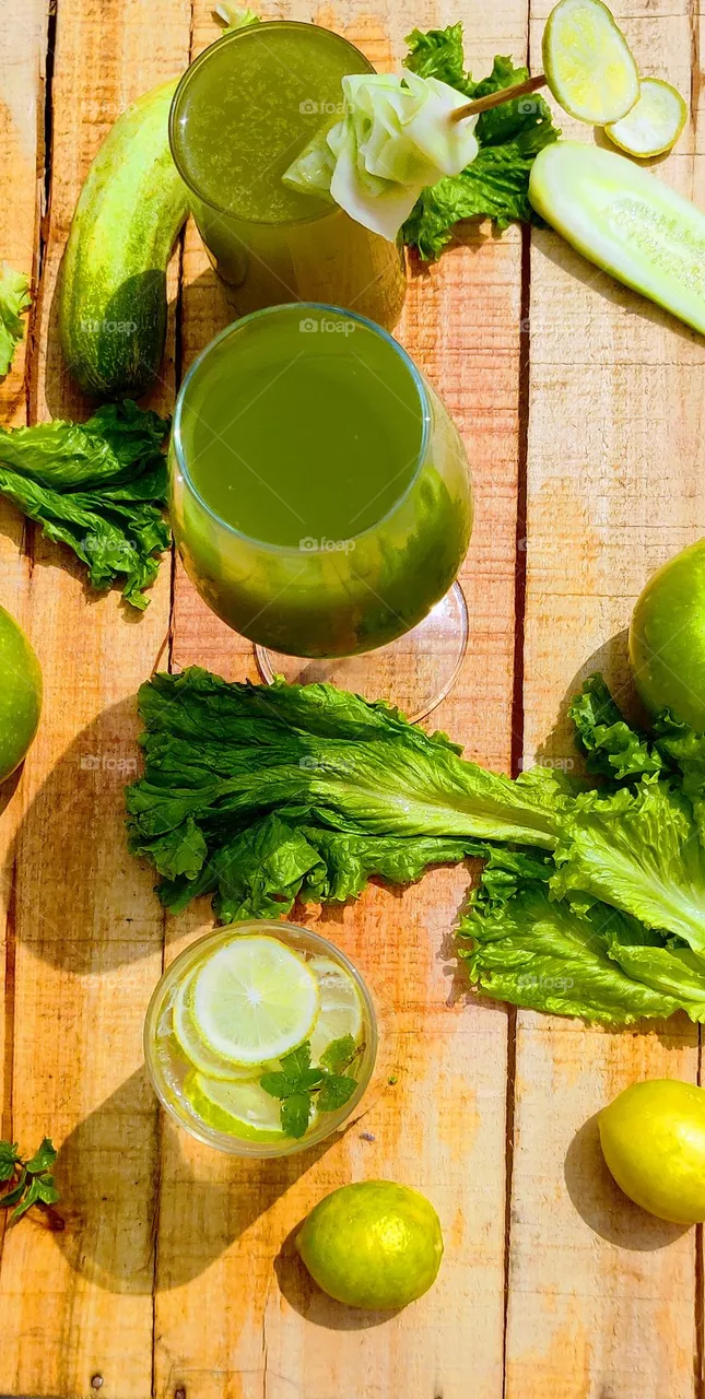 Green vegetable and green fruit juices . green apple juice with salary and lemon , fresh lemon and mint juice, cucumber lemon and mint juice .