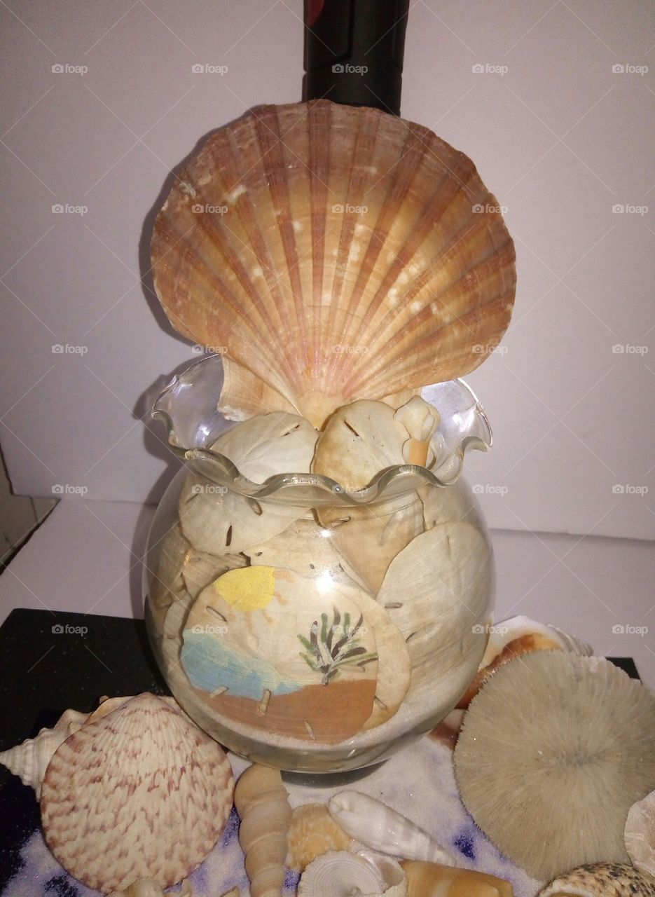 Glass jar with seashells