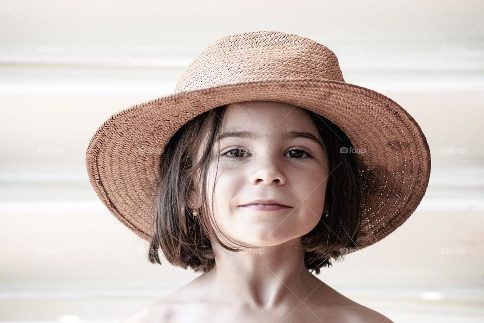 Close up portrait of a girl with HAT