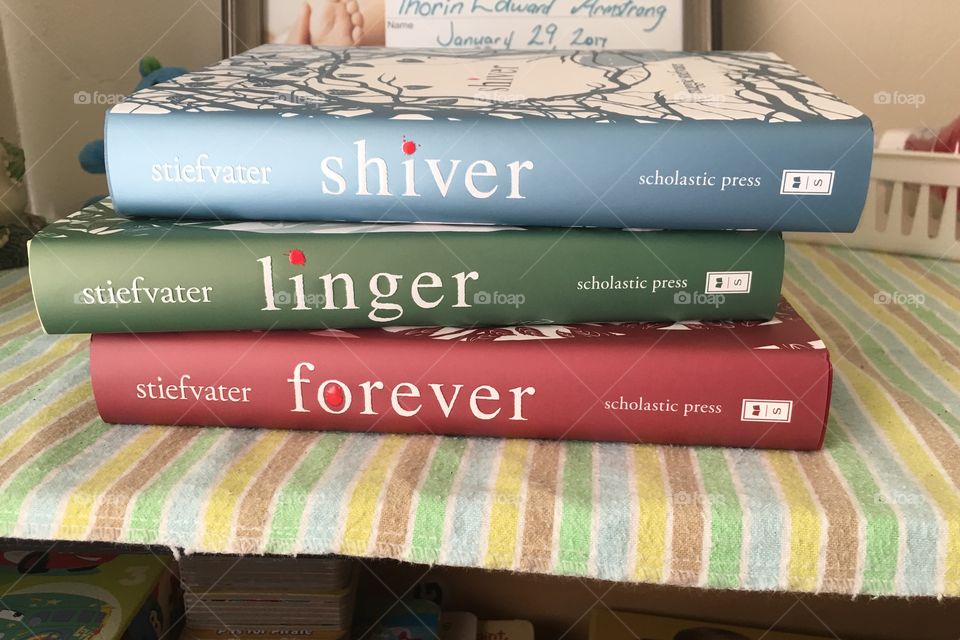 Shiver, Linger, Forever all by Maggie Stiefvater. The Shiver Trilogy is one of my favorite sets. They just feel good in your hands. 