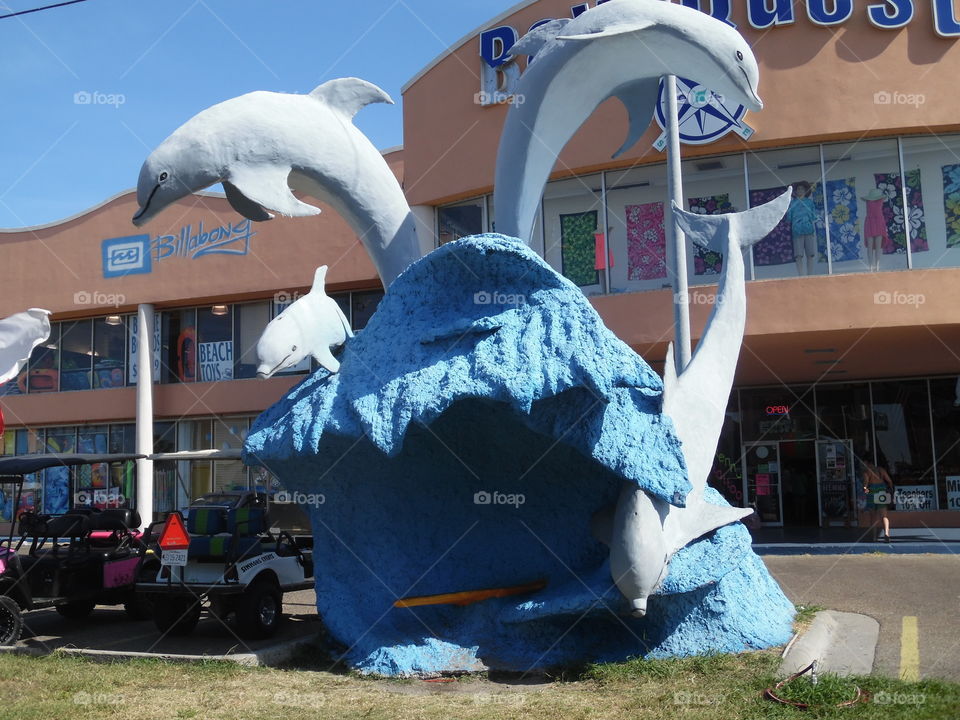 dolphin 🐬 statue. This is a vacation photo 📷 that I took while visiting port Aransas Texas. 👣 🚶 🏃 🔥 💨