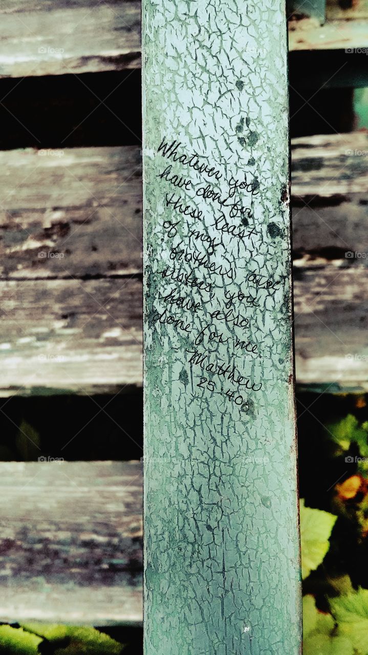 Bible verse written on a railing