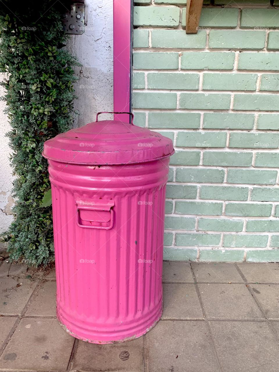 Pink garbage can 