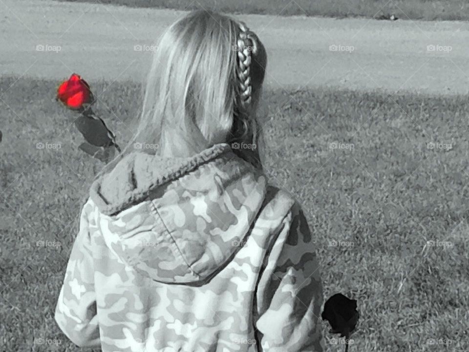 Broken heart; red rose; little girl. 