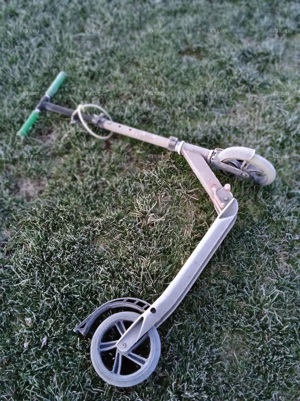 kick scooter in frosty morning.