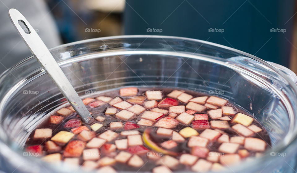 Wine punch with pieces of apple,  pear  and pineapple