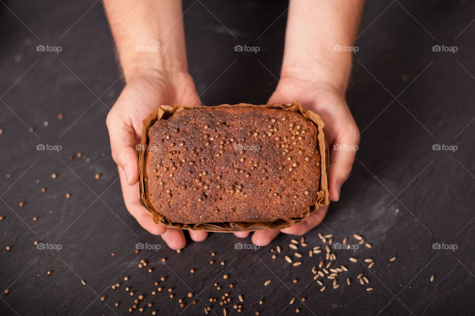 Loaf of whole grain rye bread.