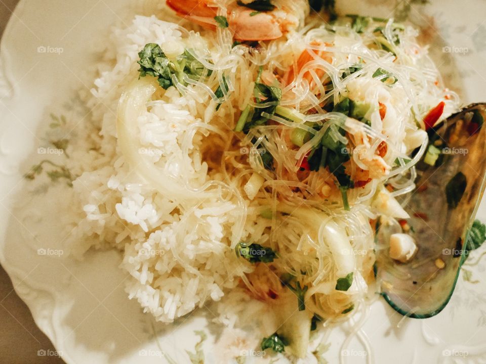 Thai seafood dish with rice and glassnudles