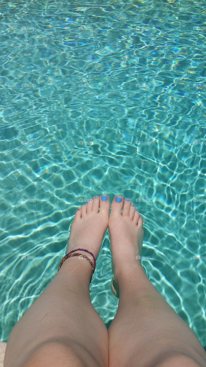 dipping my feet in the pool. summer  time