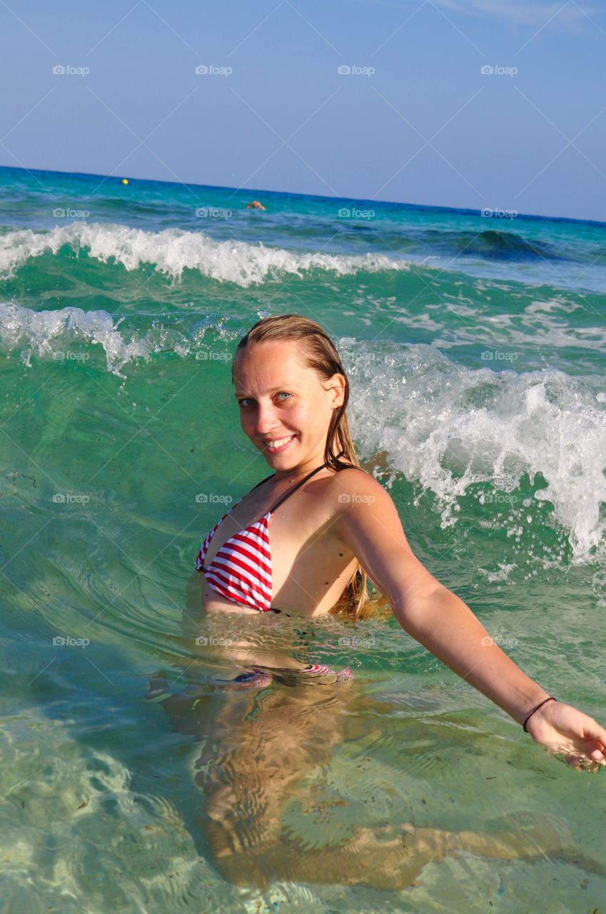 Swimming on balearic sea on Menorca island 