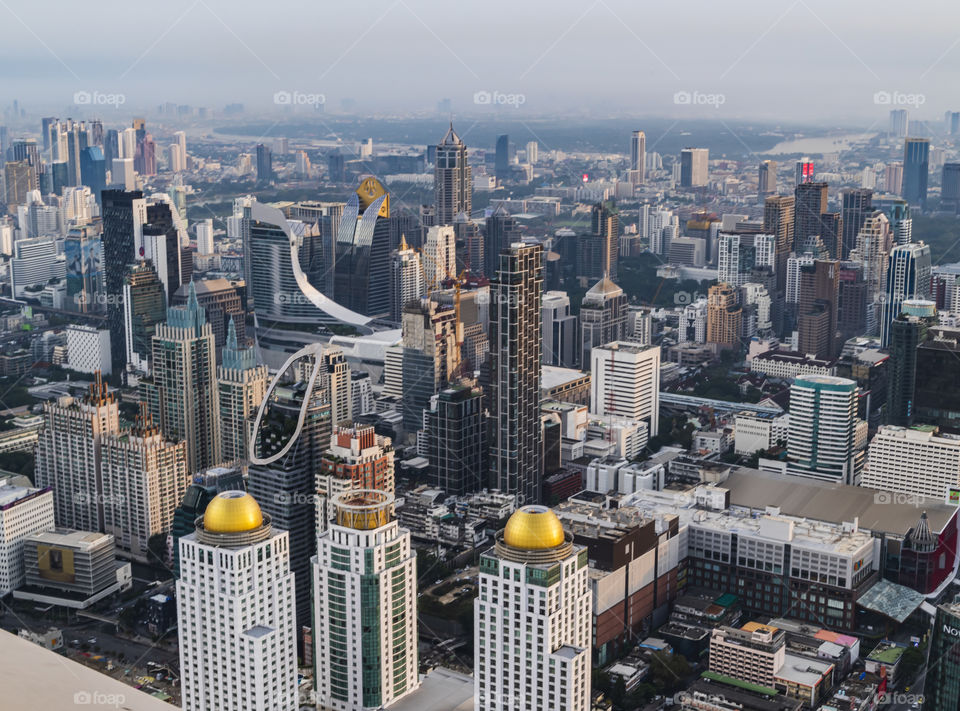 Thailand-November 21 2020:Misty conditions covered the skyscraper after heavy rain in Bangkok