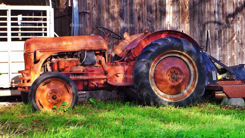 Old abandoned rusty tractor