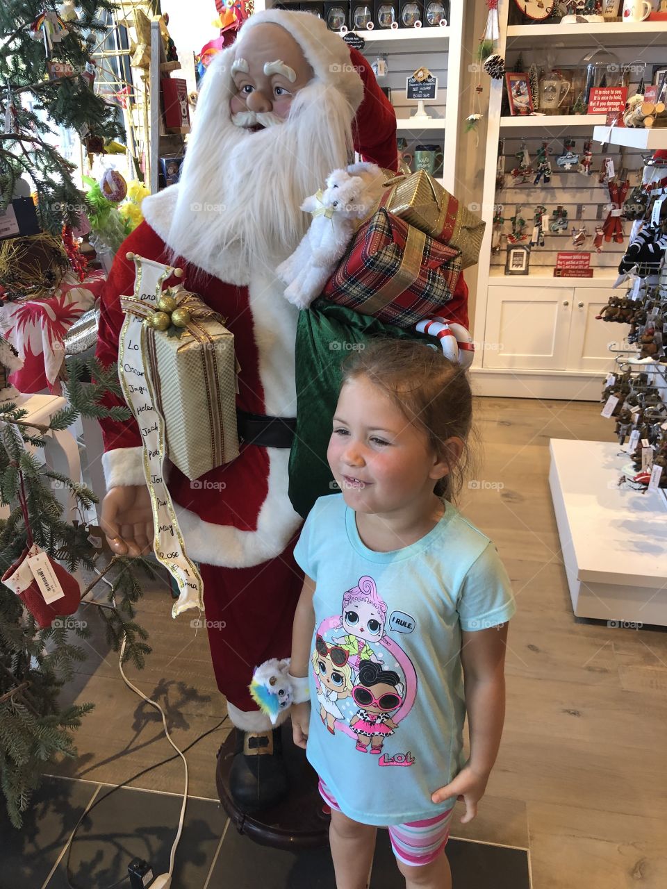 Visiting at the Christmas in July store with Santa Clause! 