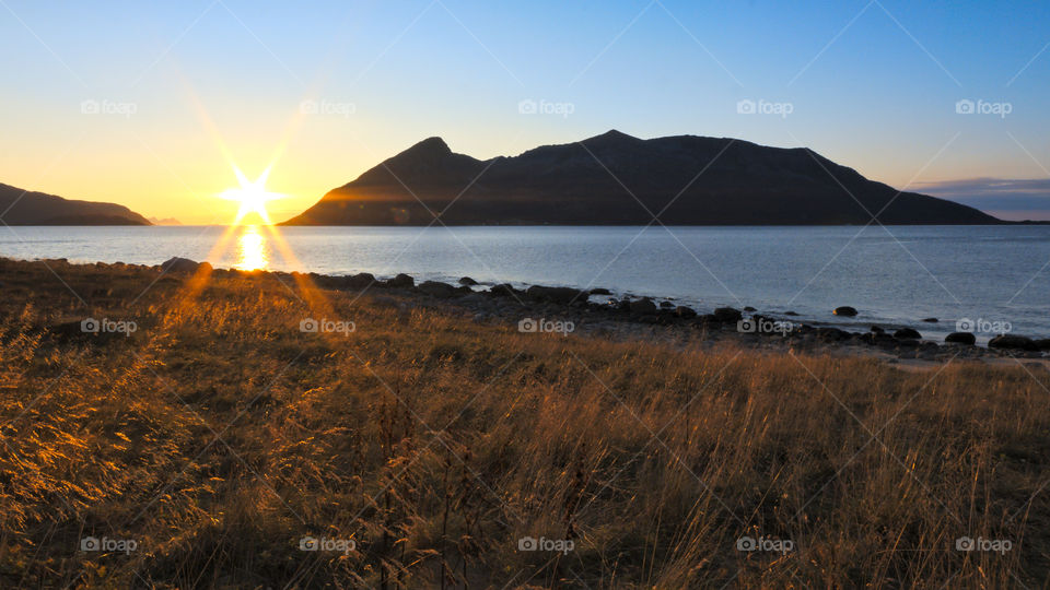 Sunset by the Norwegian Shore. Shot in Rekvik, Kvaløya, Norway.