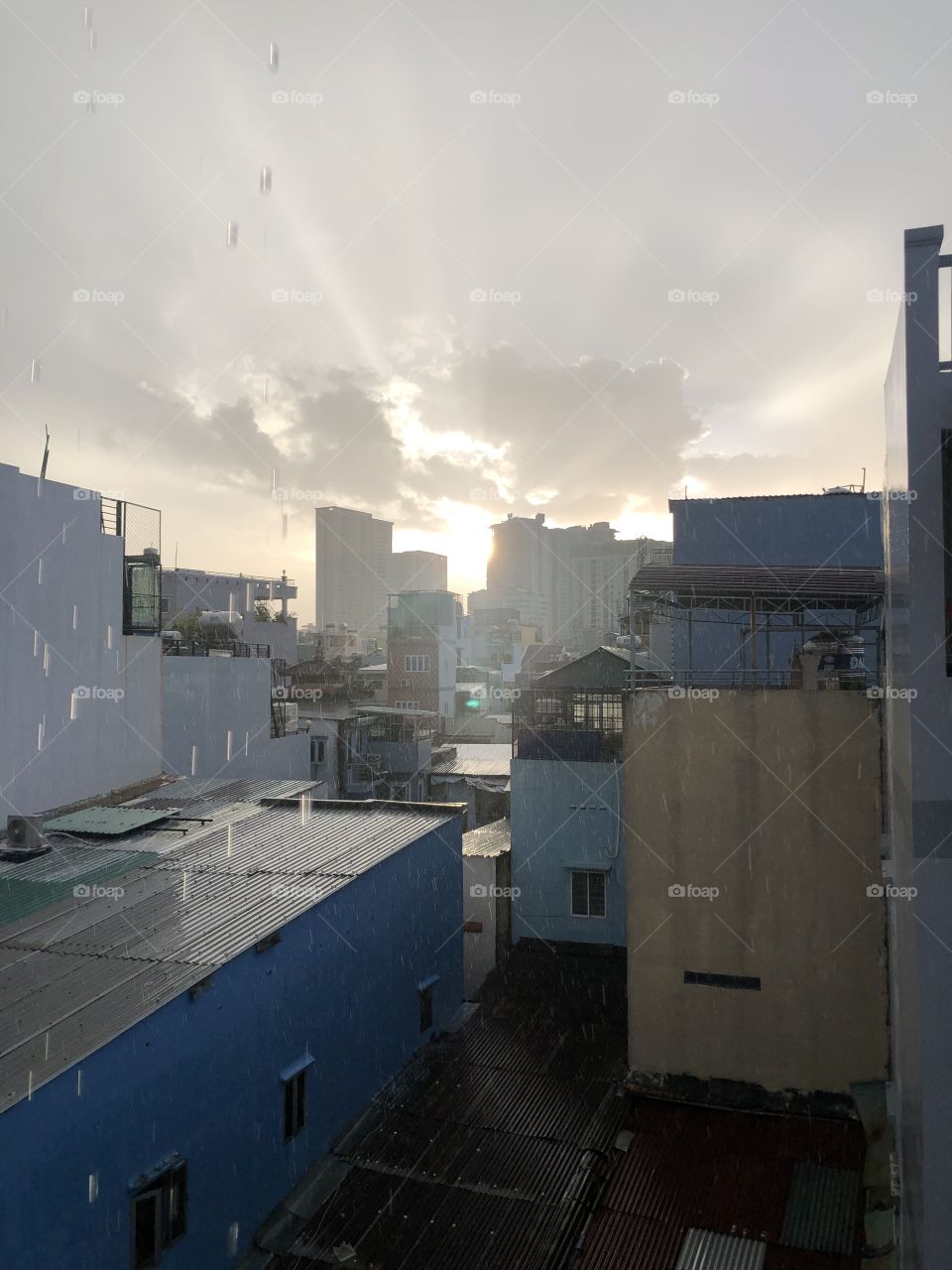 Sudden afternoon rain. It's sunny in the distance