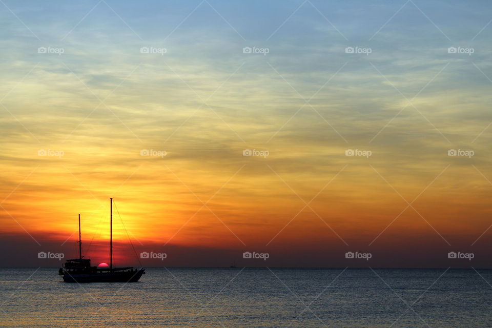 Silhouette of boat during sunset